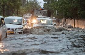 Delhi Faces Severe Waterlogging After Heavy Rains, Traffic Disruptions Reported